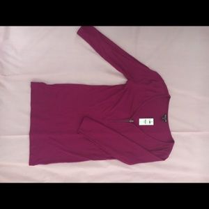 Hot pink ribbed v neck shirt.